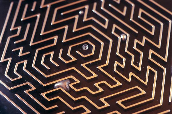 a maze puzzle toy feature beeds of mercury which are free to flow around the maze at room temperature