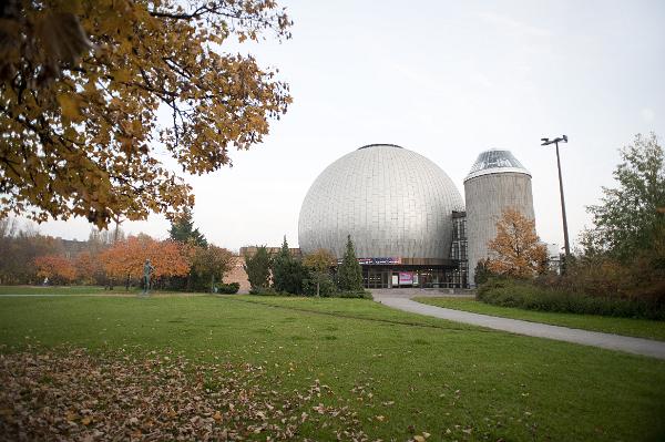 Zeiss Planetarium, Berlin View across a green lawn of the silver dome of the Zeiss Planetarium, an astronomical obervatory in Berlin, Germany