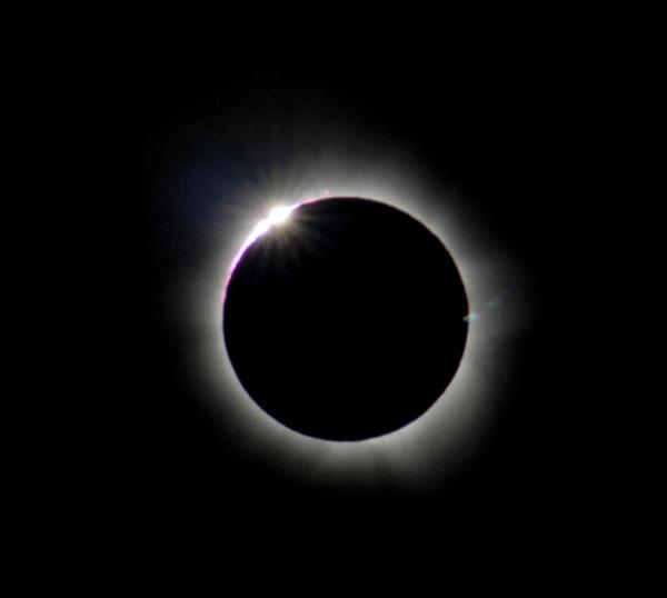 solar diamond ring A bright glint of light immediatly before totality during a solar eclipse known as a diamond ring