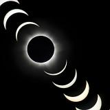 multiple exposure image of a total solar eclipse transit covering approximately one hour of the transit and eclipse totality