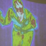 Colorful thermal view of a person standing
