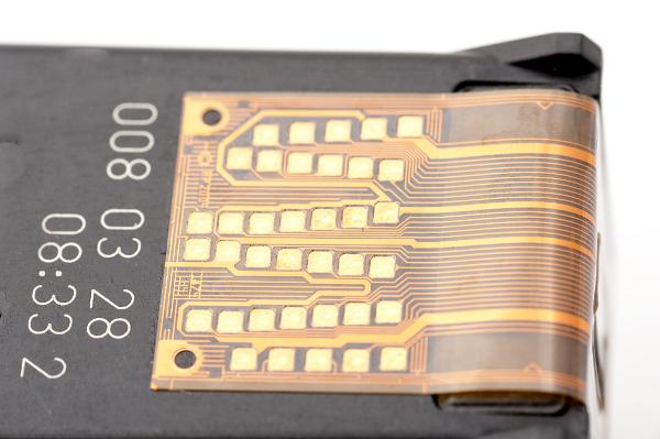 copper flex connector flexible printed circuits are widly used in the electronics industry to simplify the manufacture of electornic products, these connectors are on the edge of an inkjet printer cardtridge