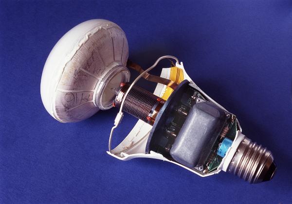 induction lamp A flourescent induction lamp works in somewhat a similar fashion to a TV by accelleration electrons towards a phosphorescent coating on the exterior of the lamp