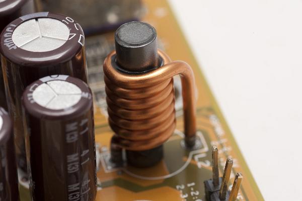 Conductor with a wire wound round a coil inductor formed with wire wound round a ferrite cylinder, an inductor is a passive dual terminal electrical component designed to oppose changes in electric current.