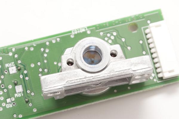 seminconductor laser the lens and heatsink of a semiconductor laser as found inside a laser printer