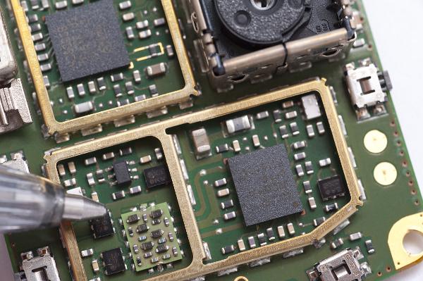 Circuit board being repaired Circuit board being repaired close up on white background